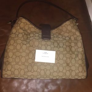 In box NWT large coach bag